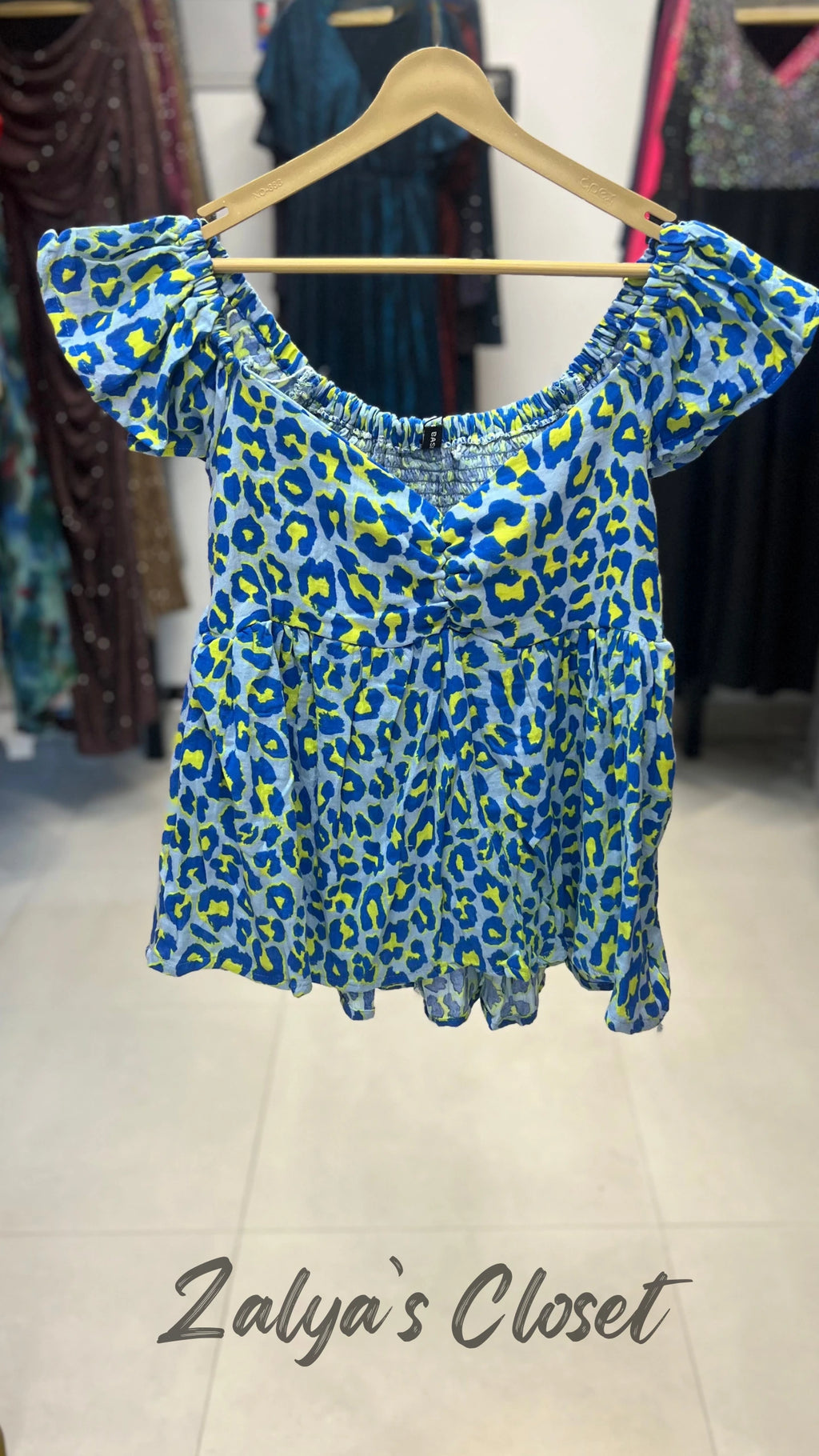 Peplum Style Smocking Printed Top image 9