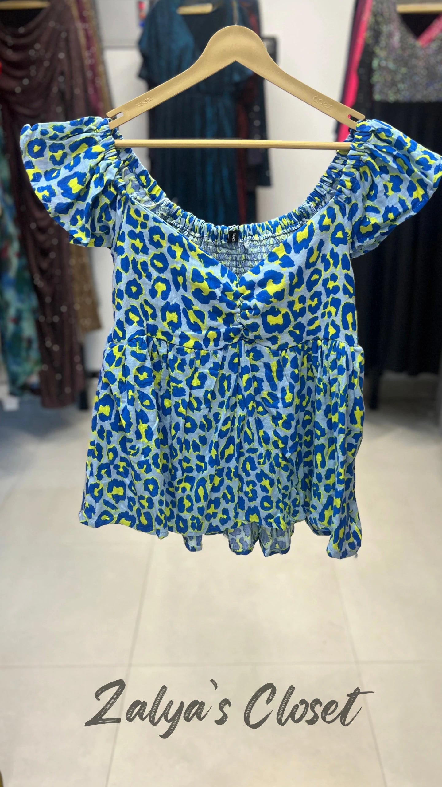 Peplum Style Smocking Printed Top image 9