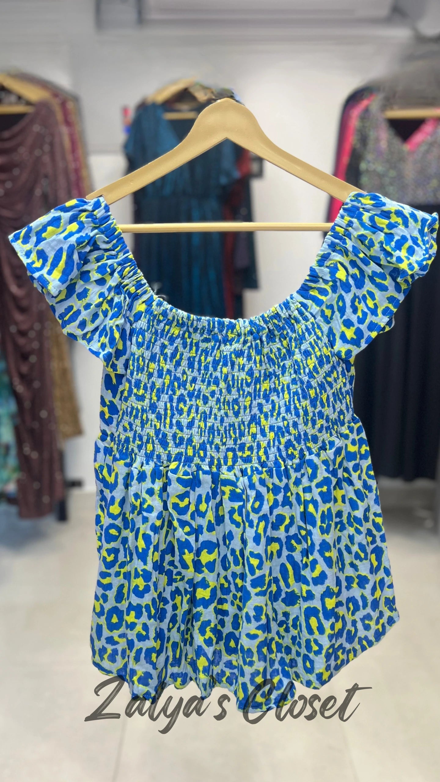 Peplum Style Smocking Printed Top image 8