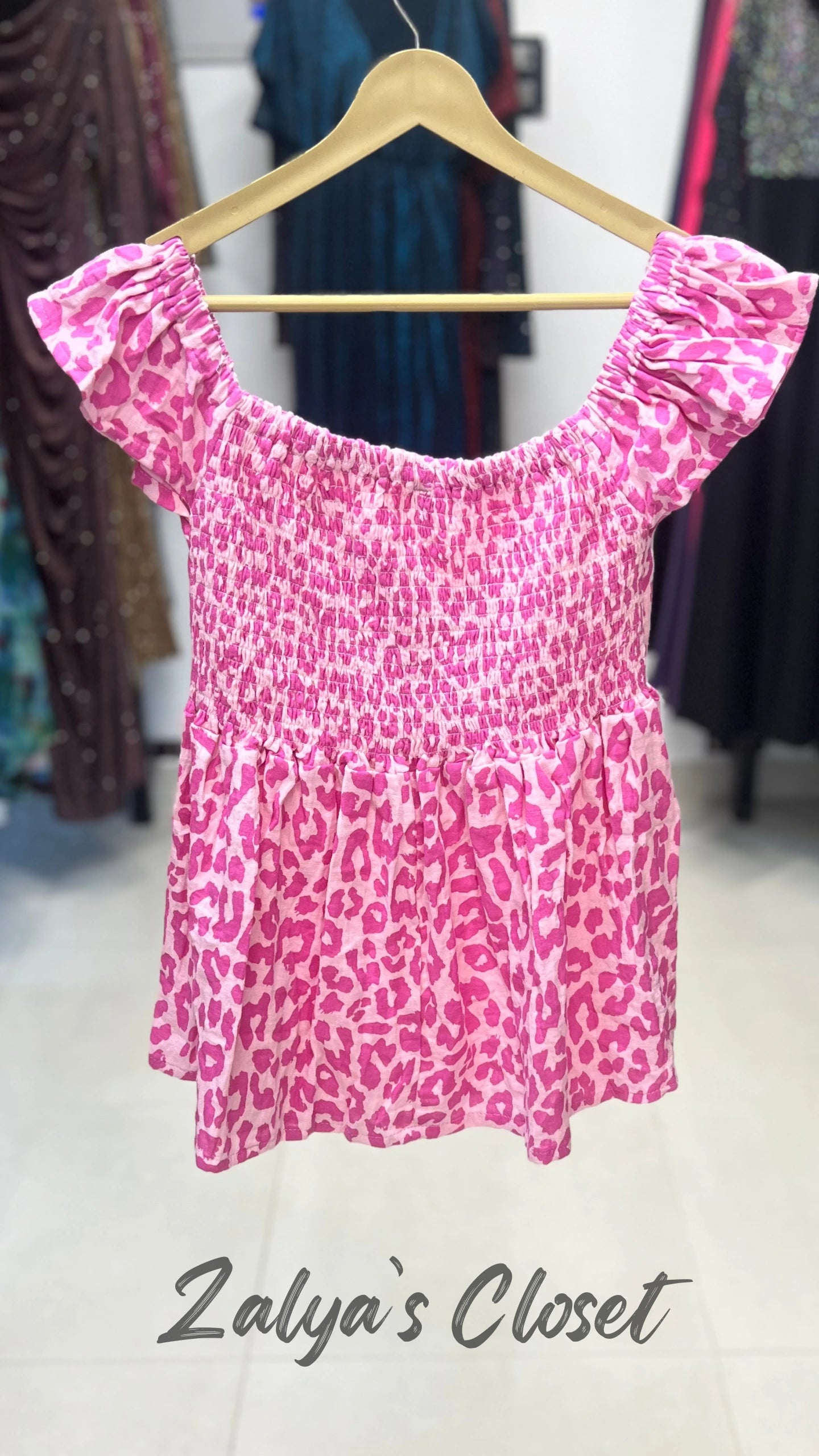 Peplum Style Smocking Printed Top image 3