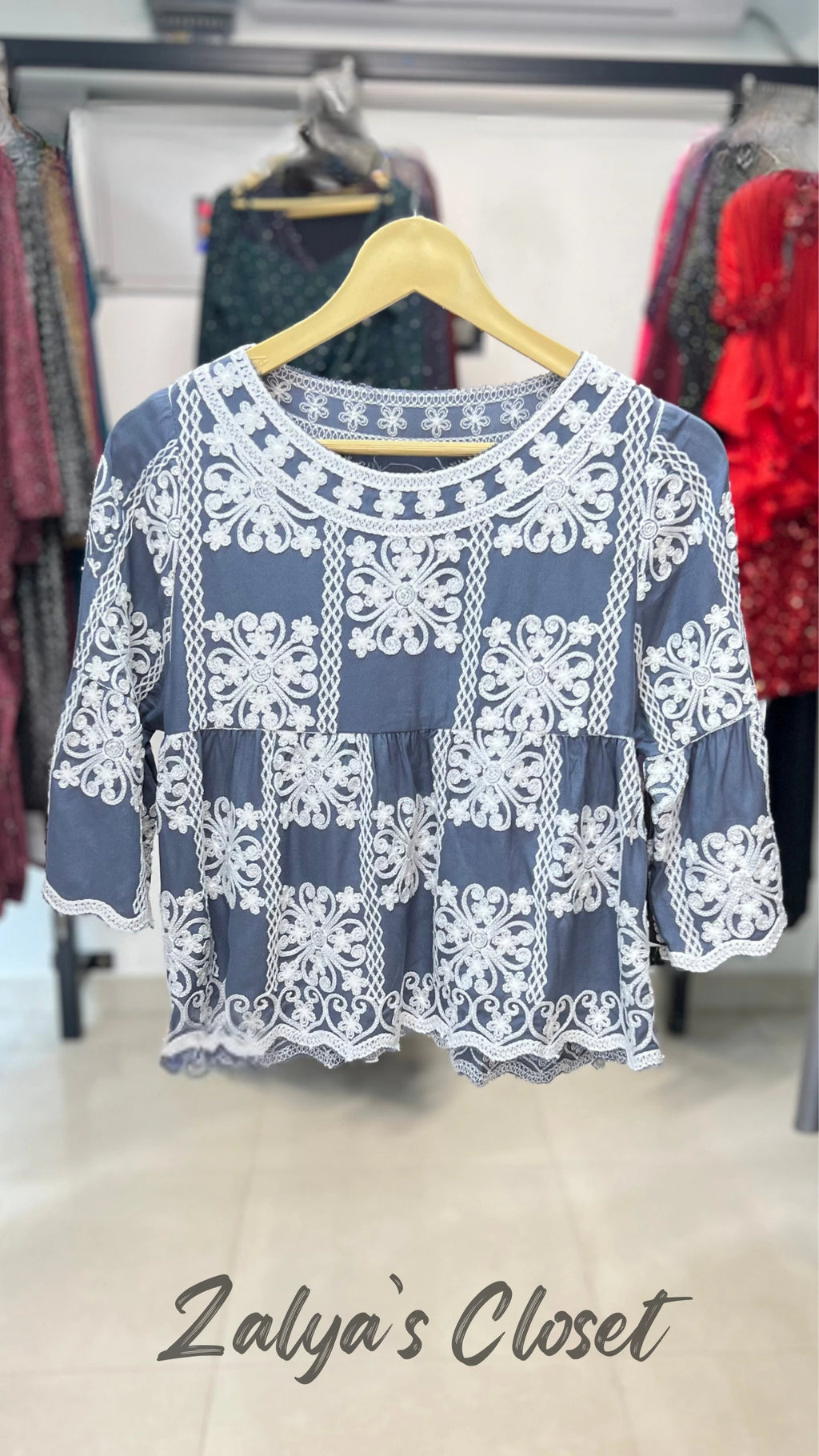 Top with Embroidered Detailing image 21