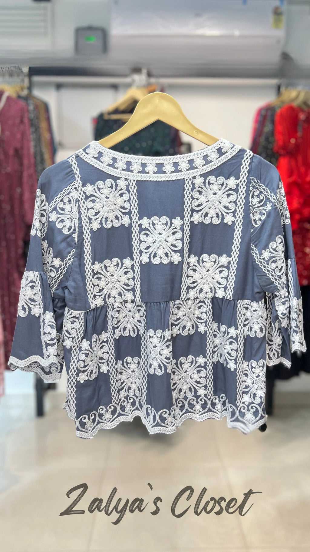 Top with Embroidered Detailing image 13